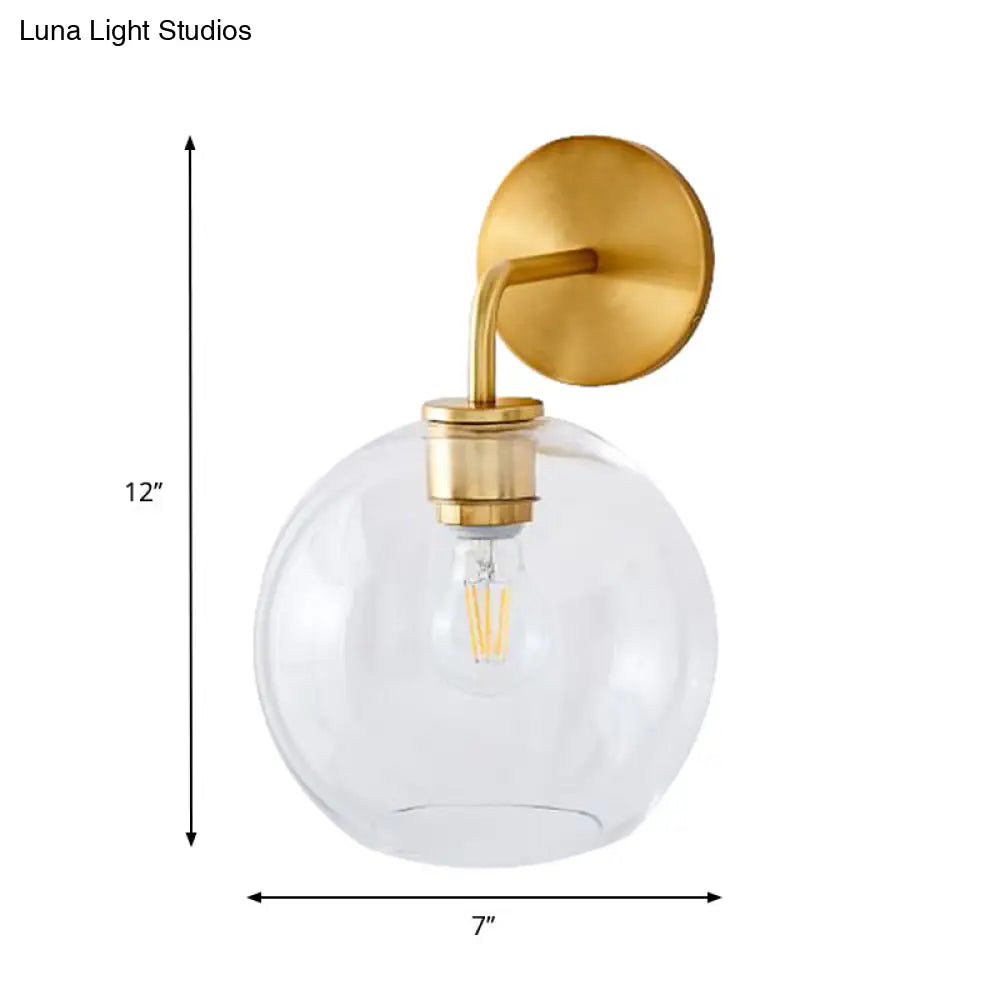 Modern Glass Orb Wall Sconce With Brass Arm Clear/White