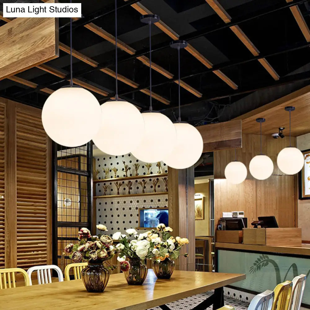 Modern Glass Pendant Lighting Fixture - White Hanging Light For Globe Clothes Shop