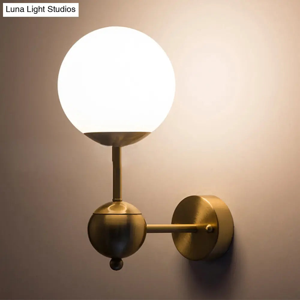 Modern Globe Wall Sconce Light In Brass With White Glass - Bathroom Lighting Fixture