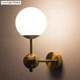 Modern Globe Wall Sconce Light In Brass With White Glass - Bathroom Lighting Fixture