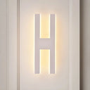 Modern Metal Led Wall Lamp With Alphabet Design - White/Black Sconce Light For Bedside In White/Warm