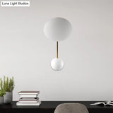 Modern Metallic Led Wall Sconce With White Disk Reading Light And Semicircle Backplate
