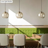 Modern Minimalist Cognac Glass Pendant Light - Stylish 1-Light Lighting For Dining Room Table