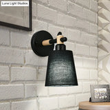 Modern Nordic Wall Lamp With Horn Shade And Wood Joint In Black/White - 1-Light Sconce