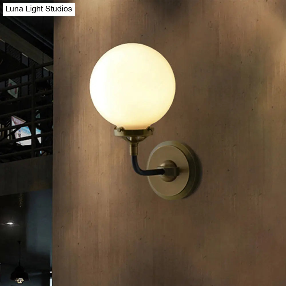 Modern Opal Glass Sconce Light With Globe Shade In Antique Brass/Chrome
