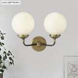Modern Opal Glass Sconce Light With Globe Shade In Antique Brass/Chrome
