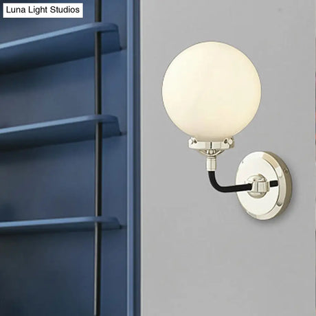 Modern Opal Glass Sconce Light With Globe Shade In Antique Brass/Chrome