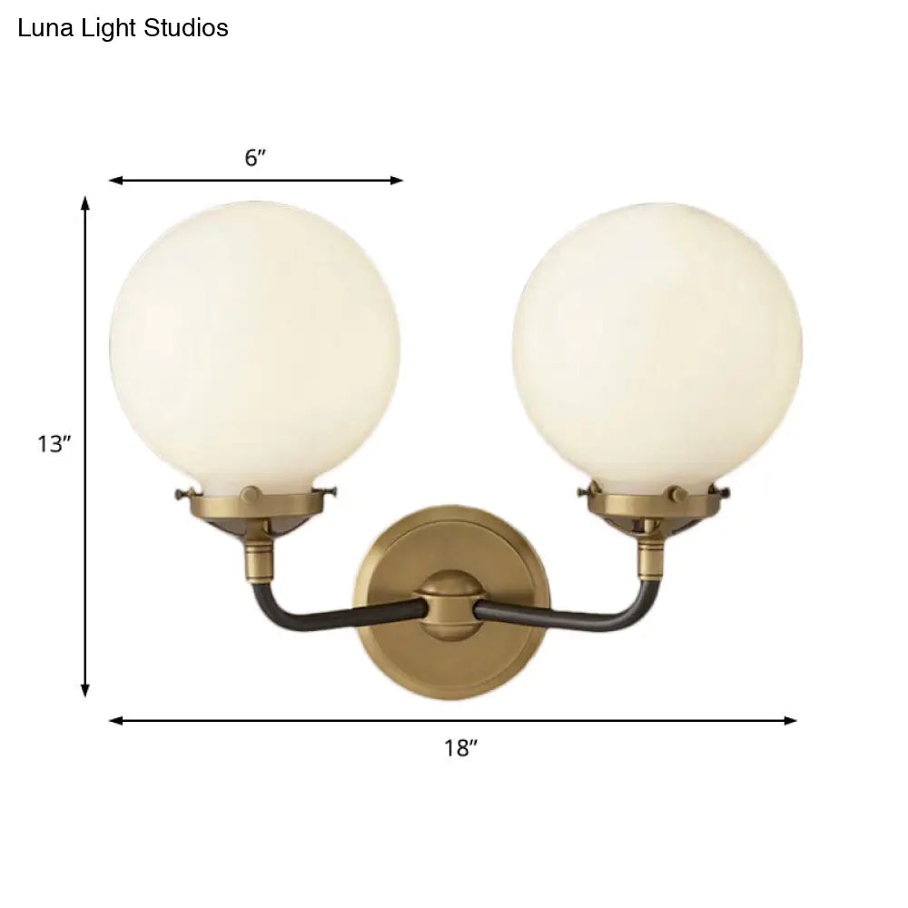 Modern Opal Glass Sconce Light With Globe Shade In Antique Brass/Chrome