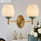 Modern Opal Glass Wall Sconce With Gold Porcelain Cap - 1/2-Light Hall Mount Fixture