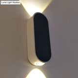 Modern Oval Led Wall Sconce Light - Sleek Black Aluminum Design Warm/White Lighting For Bedroom
