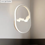 Modern Oval Wall Sconce With Led Lighting For Your Bedroom