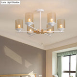 Modern Radial Iron Ceiling Chandelier - 6 Head White/Green With Wood Accents Cylinder Tan Glass