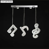 Modern Stainless Steel Led Pendant Light With Clear Crystals And Musical Note Suspension