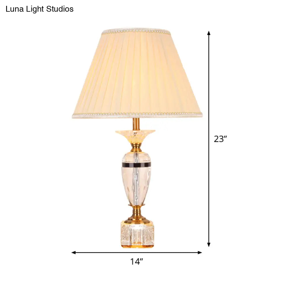 Modern Urn Shape Fabric Desk Light - Faceted Crystal 1 Bulb Night Table Lamp In Beige