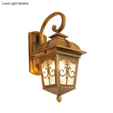 Modern Wall Sconce: Aluminum Lodges Lantern Lamp In Black/Brass With Water Glass Shade