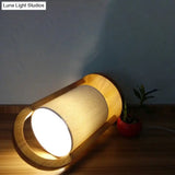 Modern White Cylindrical Nightstand Lamp With Wood Handle - Task Light Fabric Shade 1 Bulb