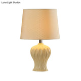 Modern White Fabric Barrel Task Lamp With Ceramic Urn Base - 1 Bulb Table Light