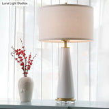 Modern White Fabric Cylinder Table Light With Cone Ceramic Base - 1 Bulb Desk Lamp