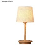 Modern White Fabric Desk Lamp With Wood Base - Tapered Design 1 Bulb Night Table Light