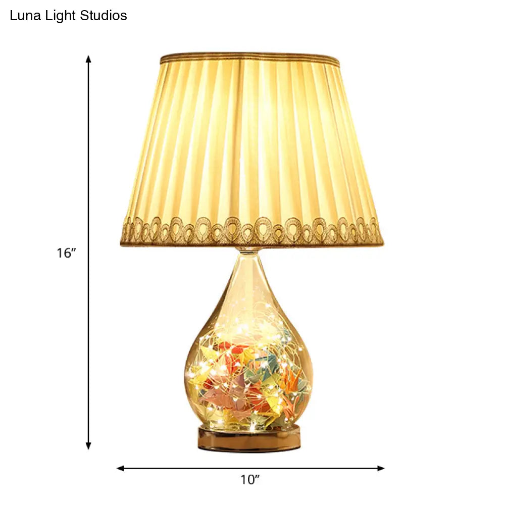 Modern White Foldable Desk Lamp With Cone Base And Inner Paper Crane Design - 1-Bulb Fabric Table