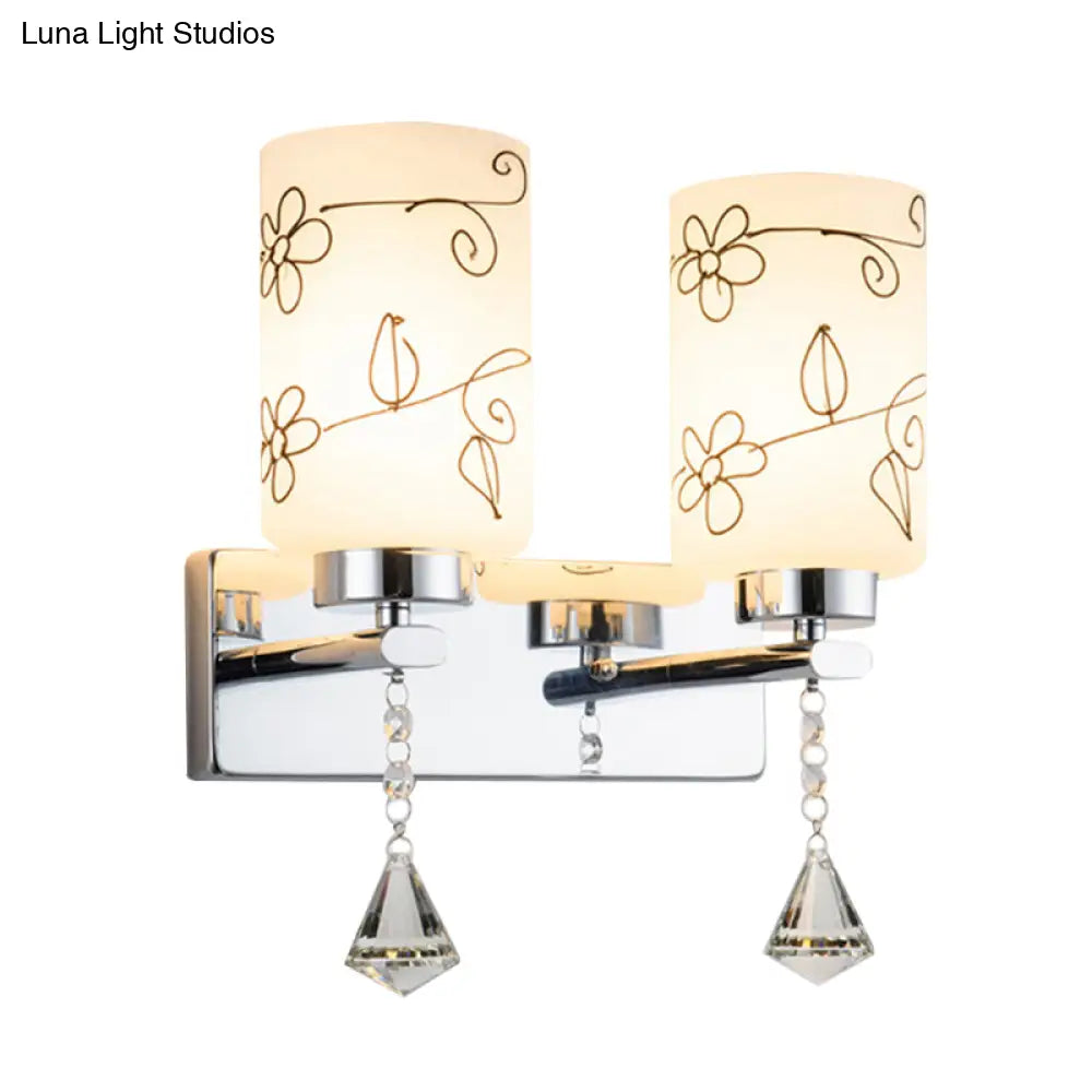 Modern White Glass Cylinder Wall Sconce With 2 Bulbs Chrome Finish And Elegant Flower Pattern