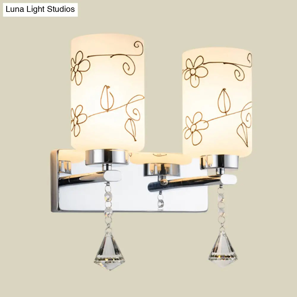 Modern White Glass Cylinder Wall Sconce With 2 Bulbs Chrome Finish And Elegant Flower Pattern