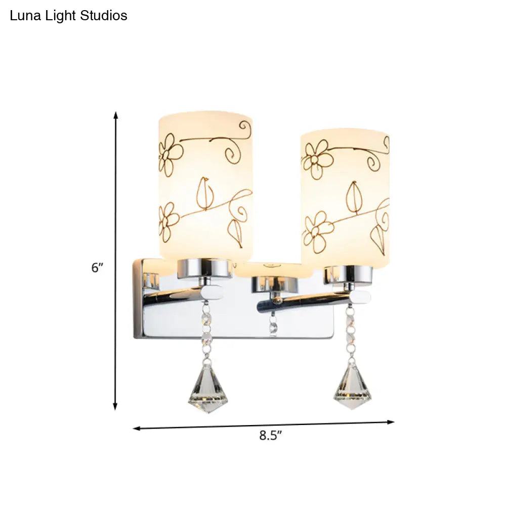 Modern White Glass Cylinder Wall Sconce With 2 Bulbs Chrome Finish And Elegant Flower Pattern