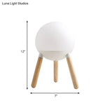 Modern White Globe Cream Glass Table Light With Tripod Wood Base