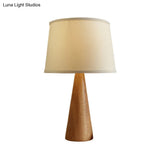 Modern White Nightstand Lamp With Shaded Fabric Table Light And Conical Brown Wood Base