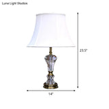 Modern White Table Lamp With Flared Shape And Fabric Shade Perfect For Task Lighting