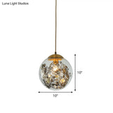 Modern Yellow Ball Pendant Lamp - 1-Head Clear Glass Ceiling Light With Inner Shattered Leaves