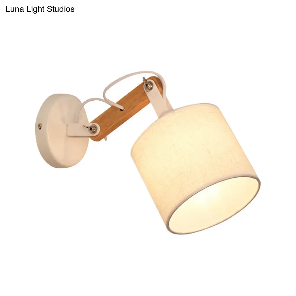 Modernist Fabric Cylinder Wall Lamp With Adjustable Wood Arm And White Bulb