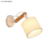 Modernist Fabric Cylinder Wall Lamp With Adjustable Wood Arm And White Bulb