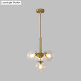 Modernist Gold Globe Pendant Light Fixture - Clear Water Glass 4 Heads