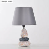 Modernist Led Night Table Lamp In Black/Grey Ceramic Stone Shape With Fabric Shade