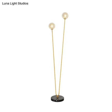 Modernist Metallic Gold Led Floor Reading Lamp With U-Shaped Design And Globe Glass Shade