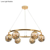 Modernist Smoke Gray Glass Ball Chandelier - 6 Head Brass Ring Pendant Light With Unique Glowworm