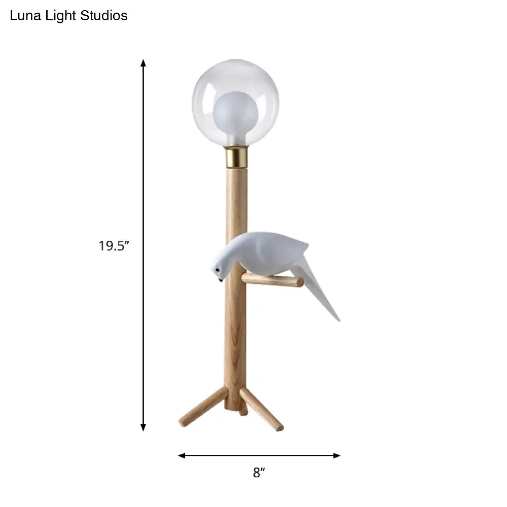 Modernist Wood Table Lamp With Clear Glass Sphere Night Light And Bird Decoled