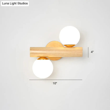Nordic White Glass Ball Rotating Wall Lamp With Wood Mount - Ideal For Bedroom Lighting