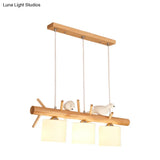 Nordic Wood Pendant Light With Opal Glass Cylinder And Resin Bird Decor