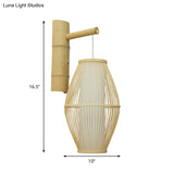 Oriental Oval Wall Light Sconce With Bamboo Lantern Design - 1-Light Beige Lamp