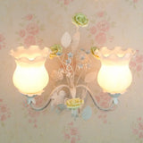 Pastoral Metal Curvy Arm Bedroom Sconce Light: 2-Head Flower Wall Lighting Fixture