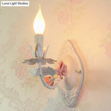 Pastoral Metallic Candle Wall Sconce: Blue/Pink 1-Light Lamp With Flower Deco