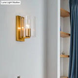 Post Modern Brass Finish Wall Lamp With Clear/Textured White Glass - Cylindric Sconce Design (1