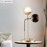 Post-Modern Clear And Black Glass 2-Light Table Lamp With Gold Finish