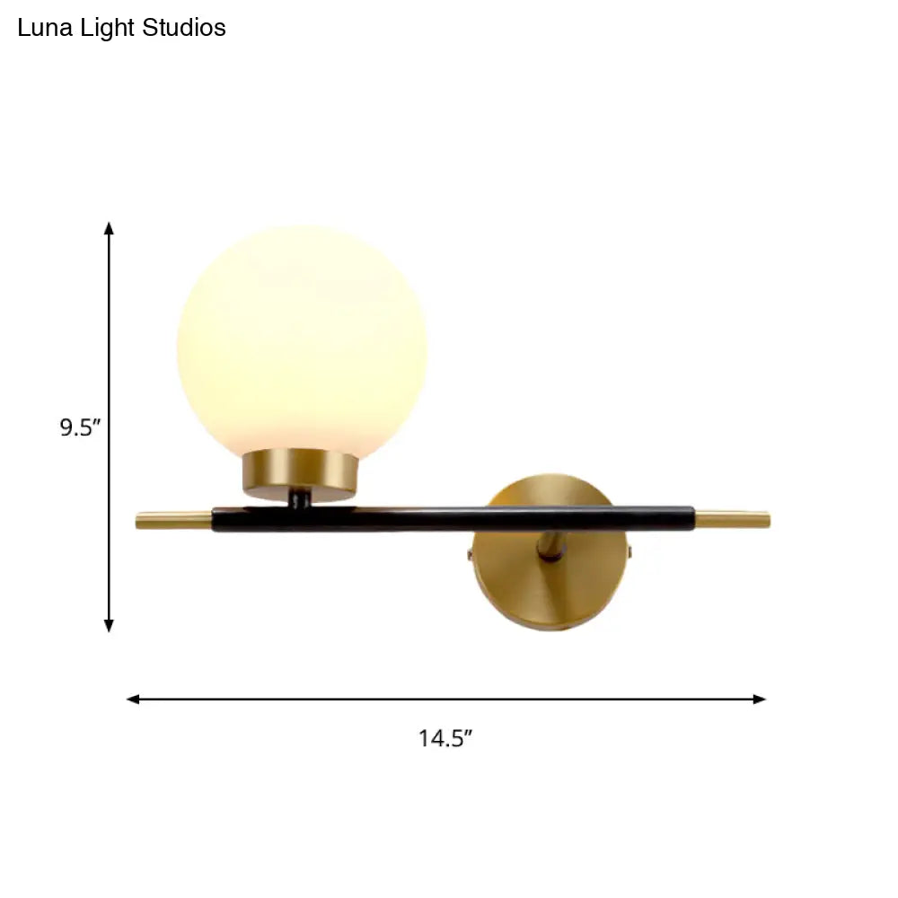 Post-Modern White Glass Sphere Wall Sconce With Brass Finish - 1/2 Bulbs