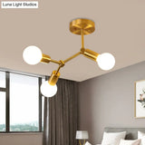 Postmodern Brass Flush Mount Lighting With Rotating Metal Molecule Design