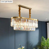 Postmodern Clear Crystal Rod Pendant Light For Dining Room In Brass Finish