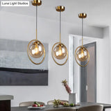 Postmodern Glass Pendant Light With Brass Ring For Bedroom - Single-Bulb Globe Down Lighting In