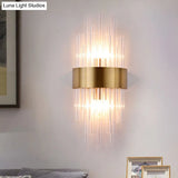 Postmodern Gold Wall Sconce With Fluted Crystal Shade - 2 Head Bedroom Mount Light